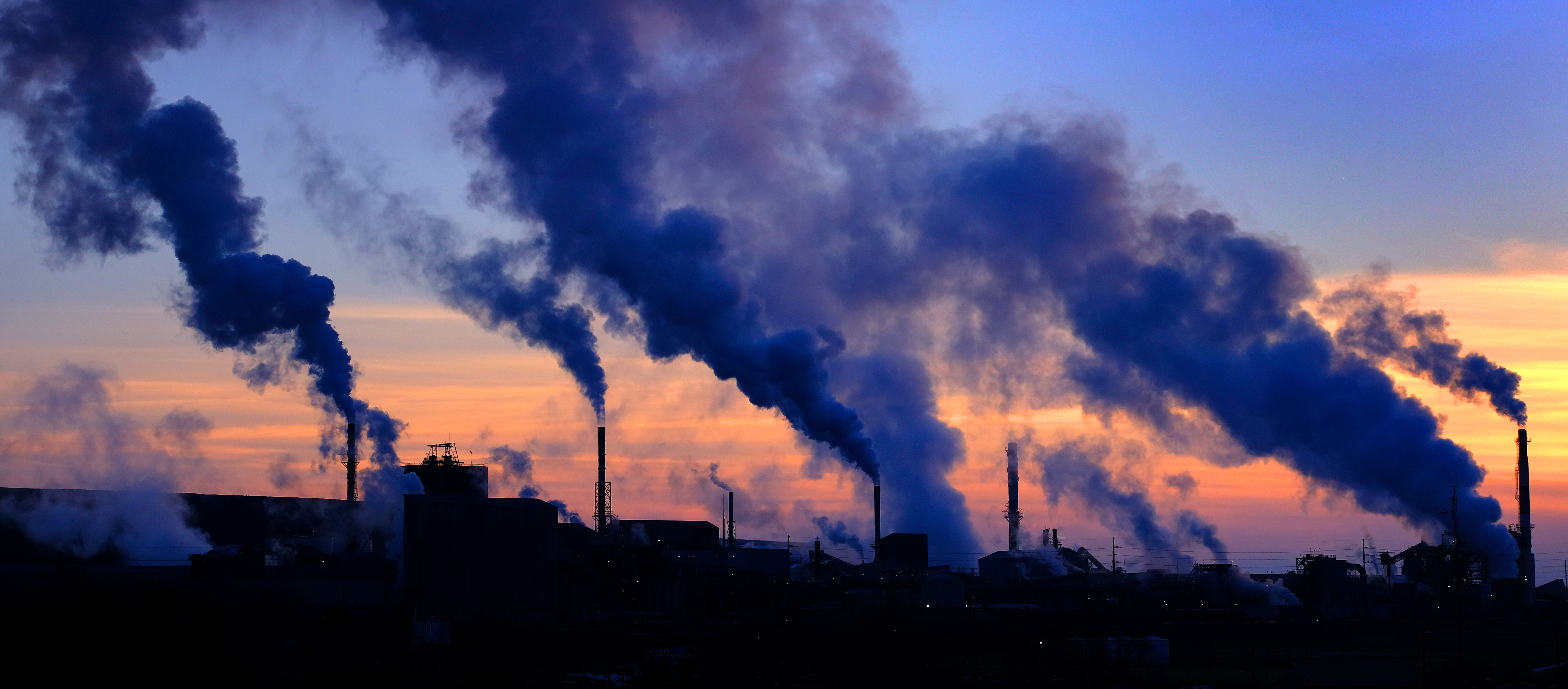 A coal plant viewed at dusk