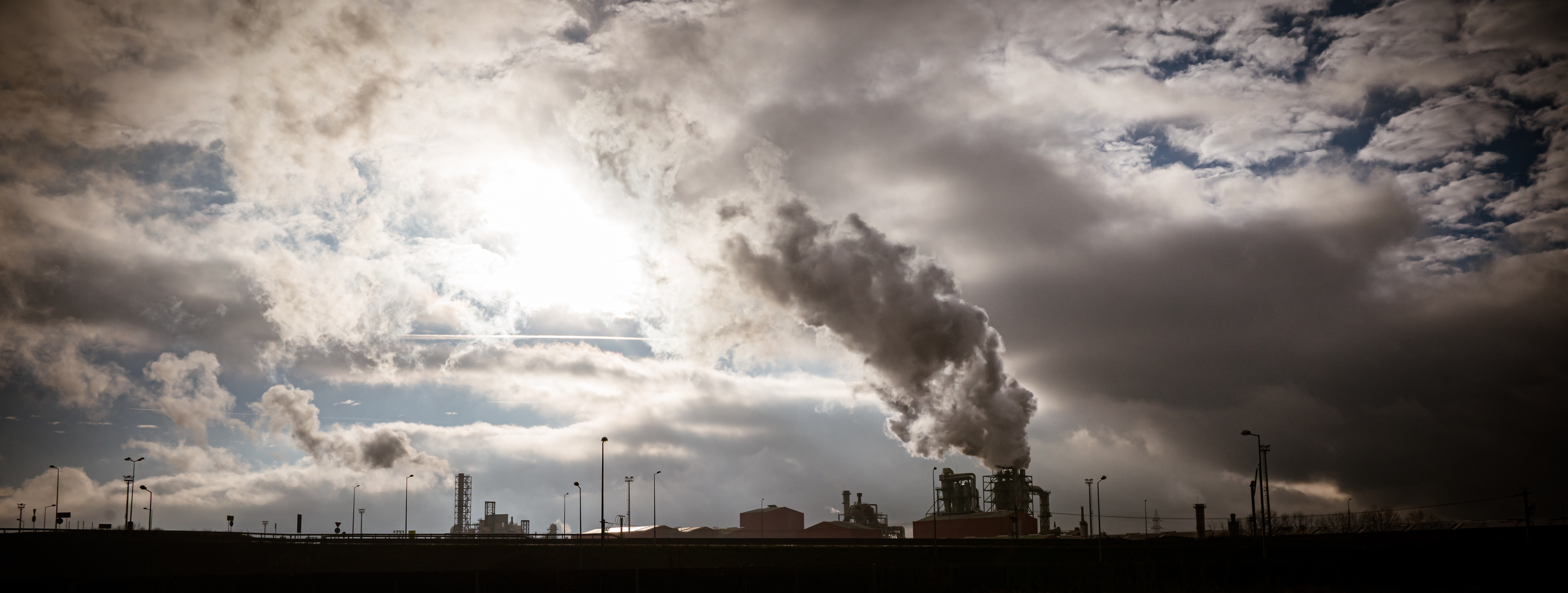 Factory releasing smoke into the atmosphere