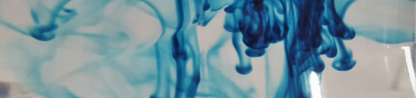 image of blue food coloring dispersing in water