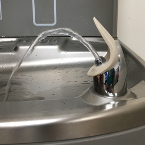 Water flowing from water fountain.