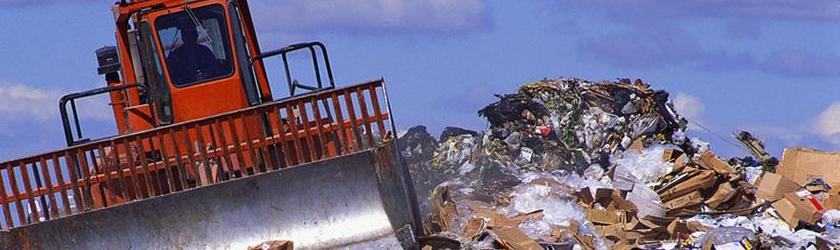 bulldozing solid waste