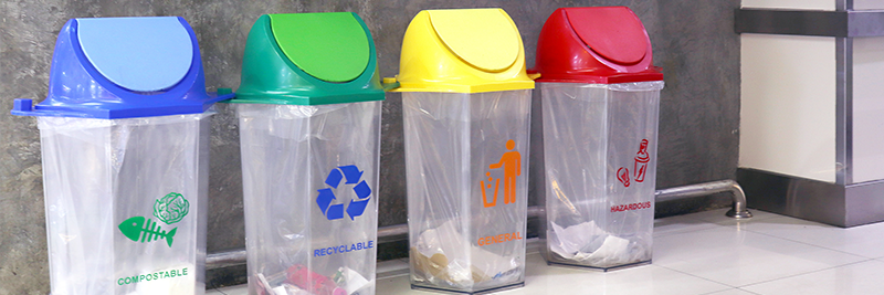 red , yellow, green and blue recycel bins