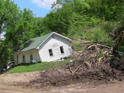 Church knocked off foundation by slide